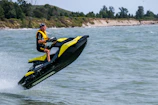 man riding personal watercraft