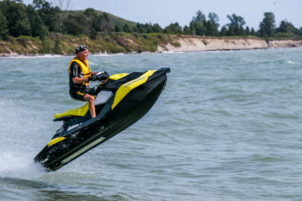 Jet ski rider on turquoise water