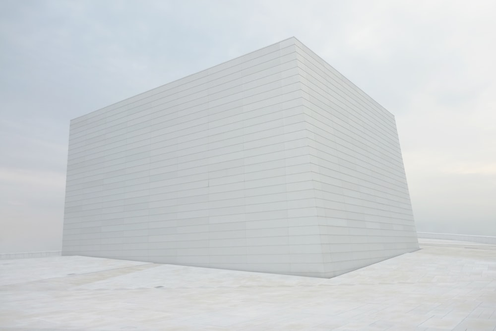 white building on snow field