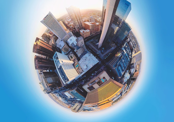 fish eye lens photography of high-rise buildings