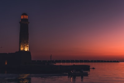 lighthouse near body of water