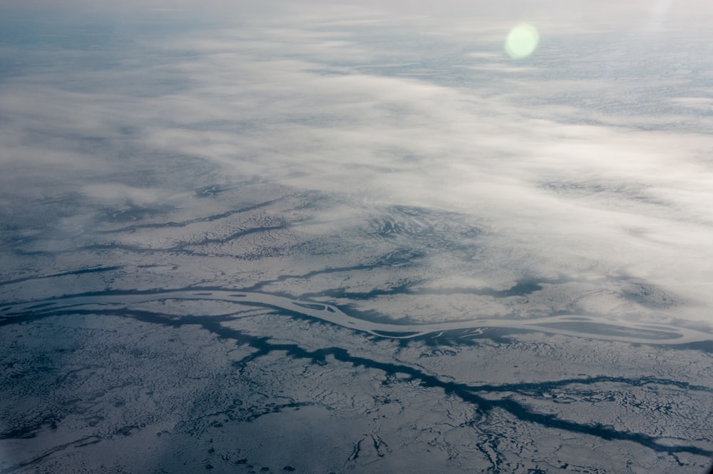 body of water covered by snow aerial view