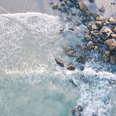 aerial photography of beach with stones