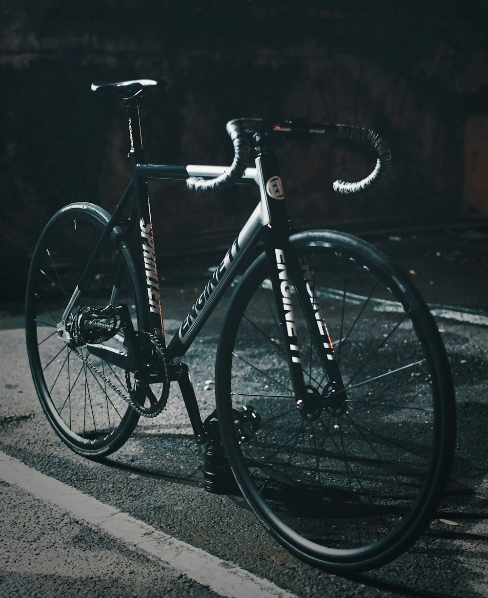 black and gray Engine 2 road bike at parking space outdoor