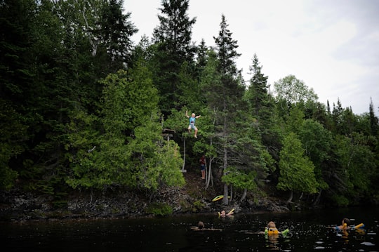 person jump on water in Bancroft Canada