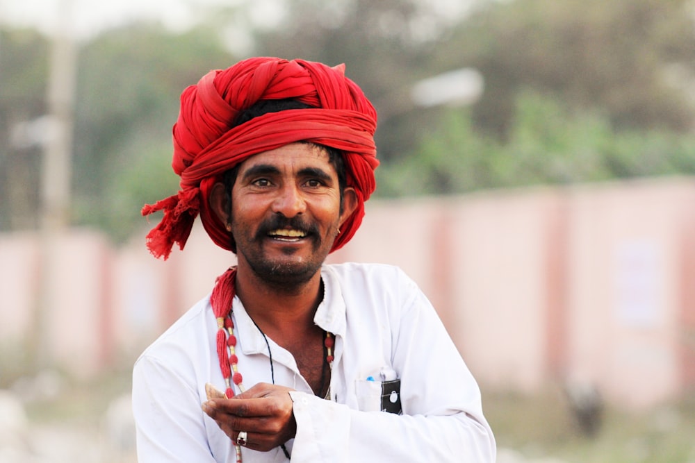 man wearing turban smiling