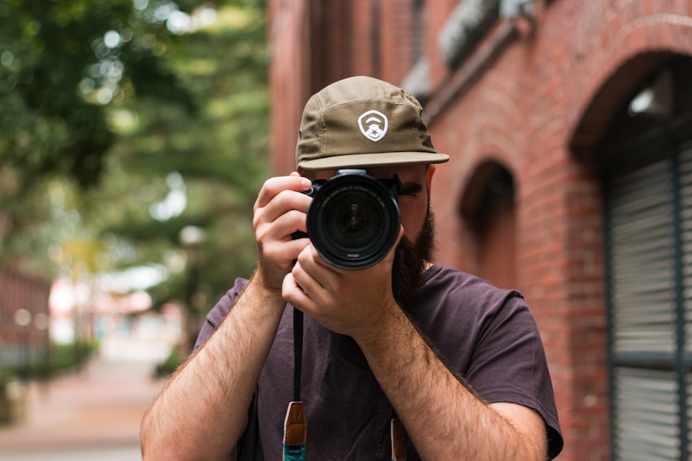 a man taking a picture of himself with a camera