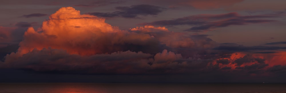 white and blue clouds during golden hour