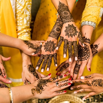 people hands with tattoes