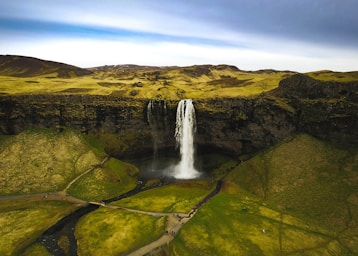 landscape photography,how to photograph dji mavic photo of beautiful waterfall in iceland, seljalandsfoss. iceland trip may 2017.; aerial photo of waterfall