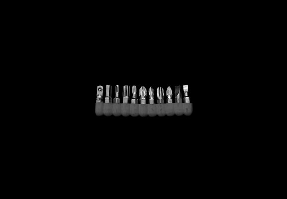 An assortment of drill bits showcasing different sizes and types.