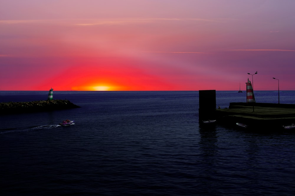 blue ocean water under sunset