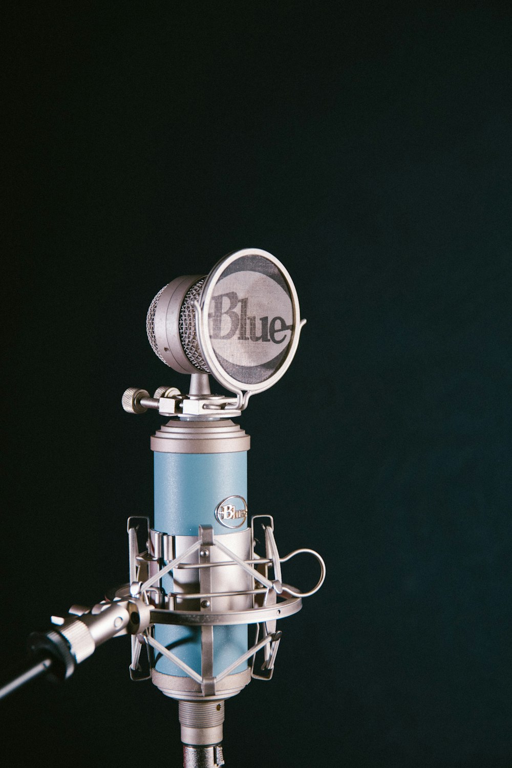 gray and blue Blue condenser with pop filter