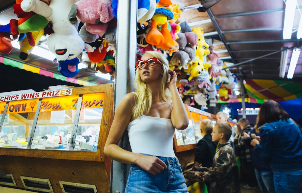 woman leaning on display case