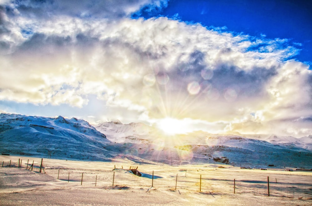 snow mountain under white clouds