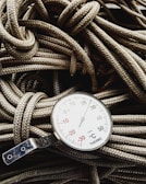 Close-up of a pyrometer measuring temperature on a red-hot steel coil
