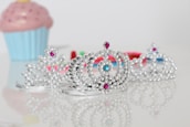 silver-colored tiara rings with clear gemstones