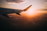 airplane on sky during golden hour