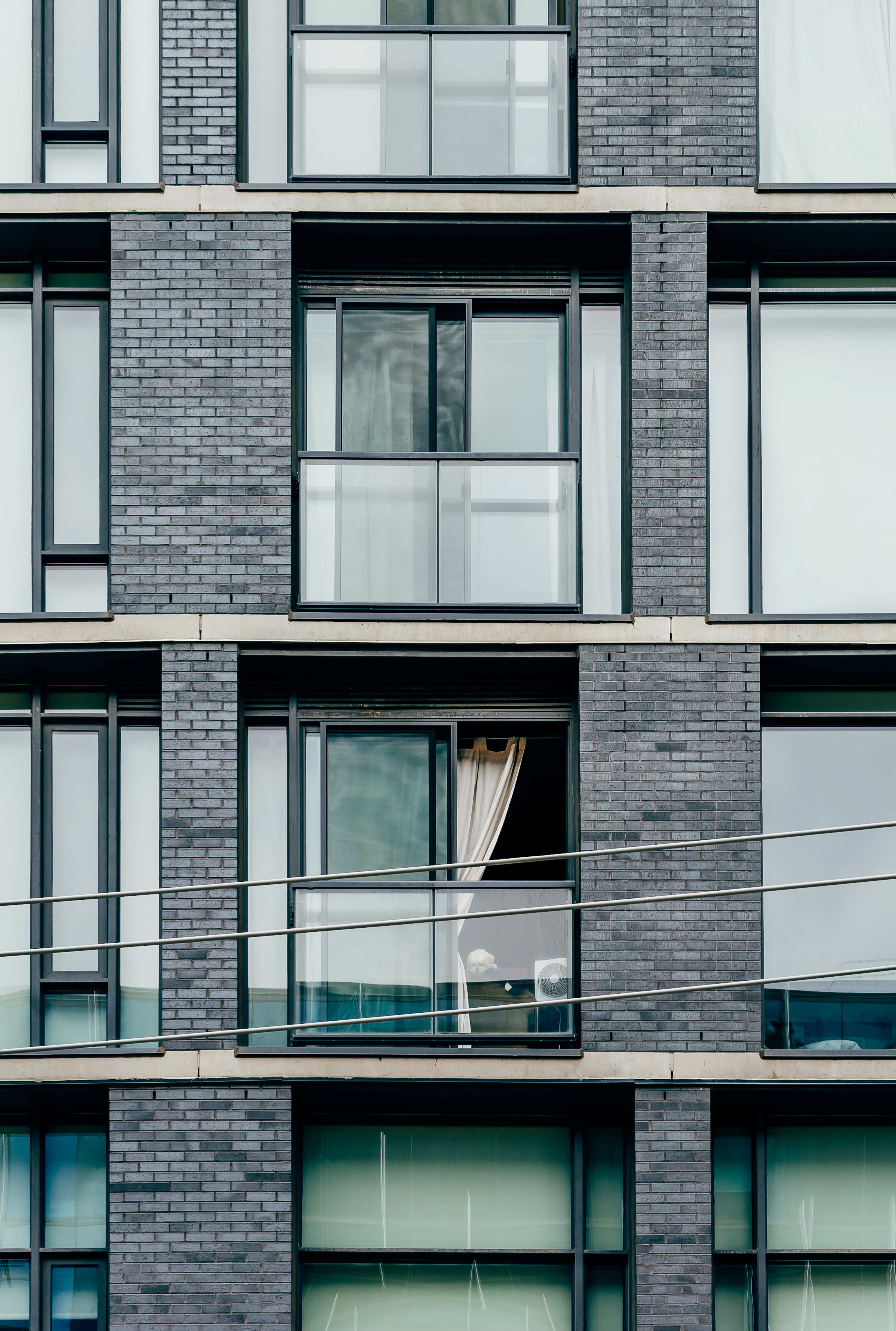 Sliding window with latch in an apartment