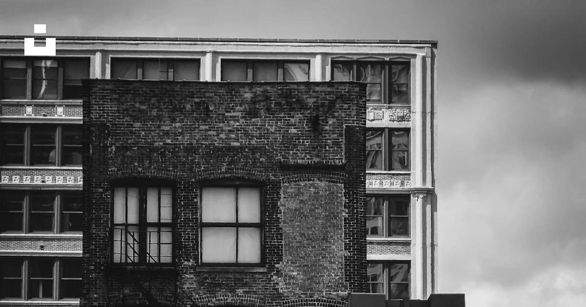 Building Facing Image Grayscale photo of people facing building photo – Free Chicago Image on ...