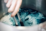 person cooking pasta