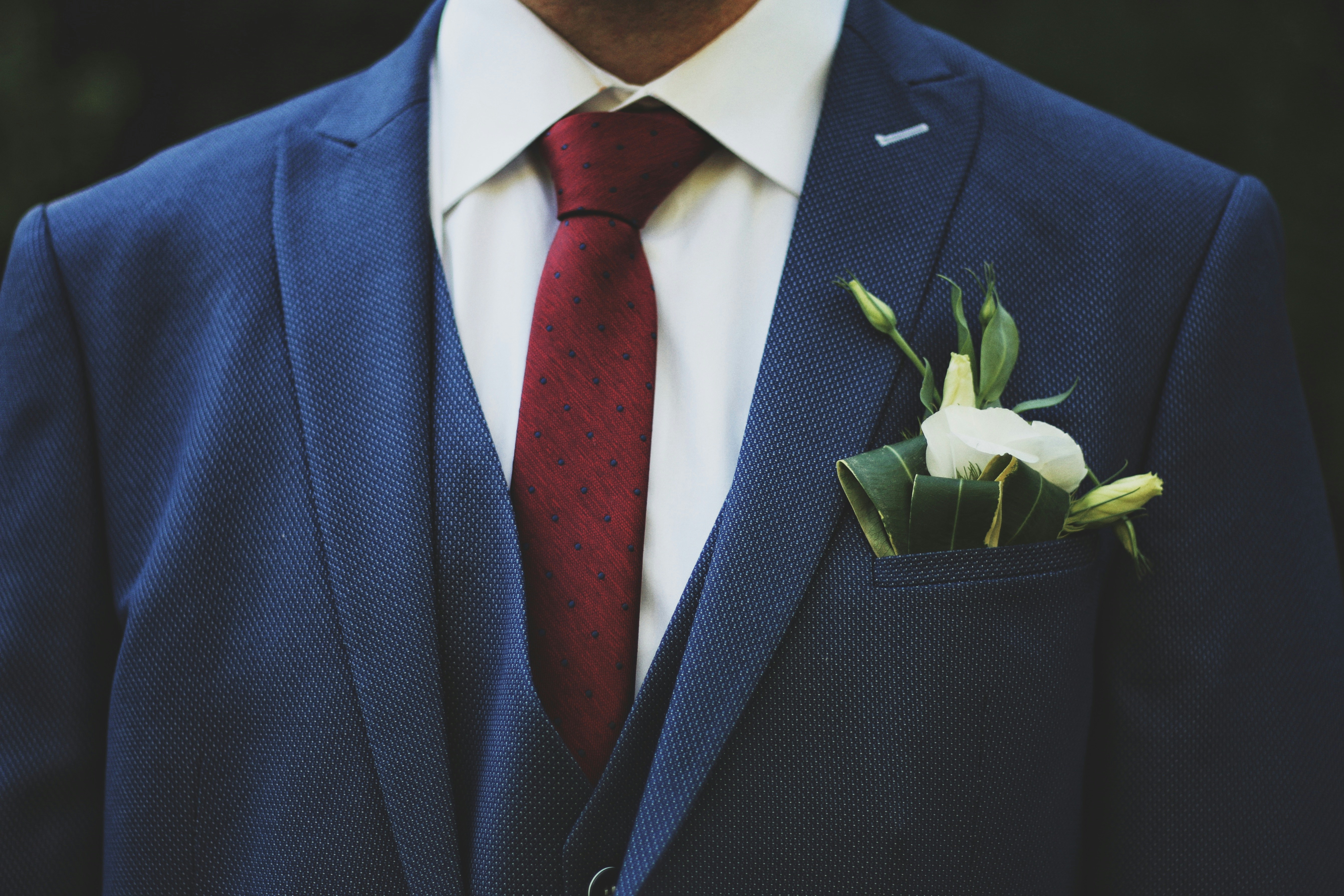 Red tie within a white shirt