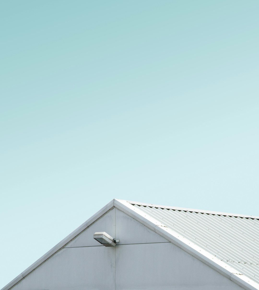  close view of white painted shed roof