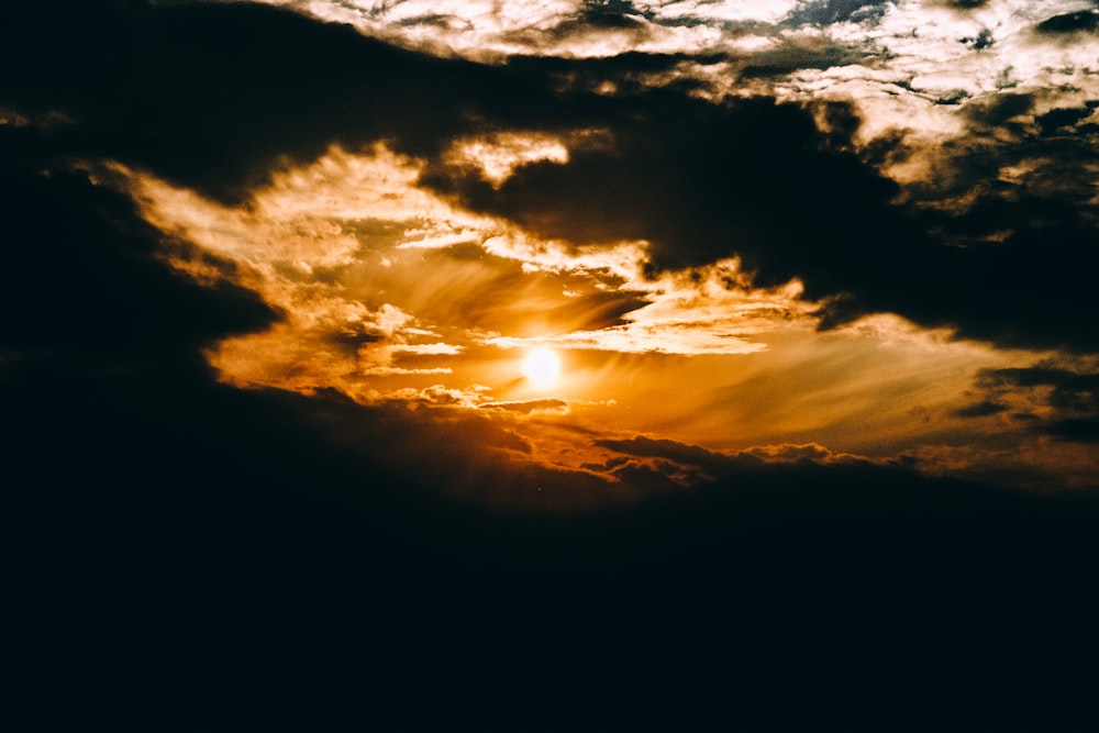 silhouette of clouds during sunset