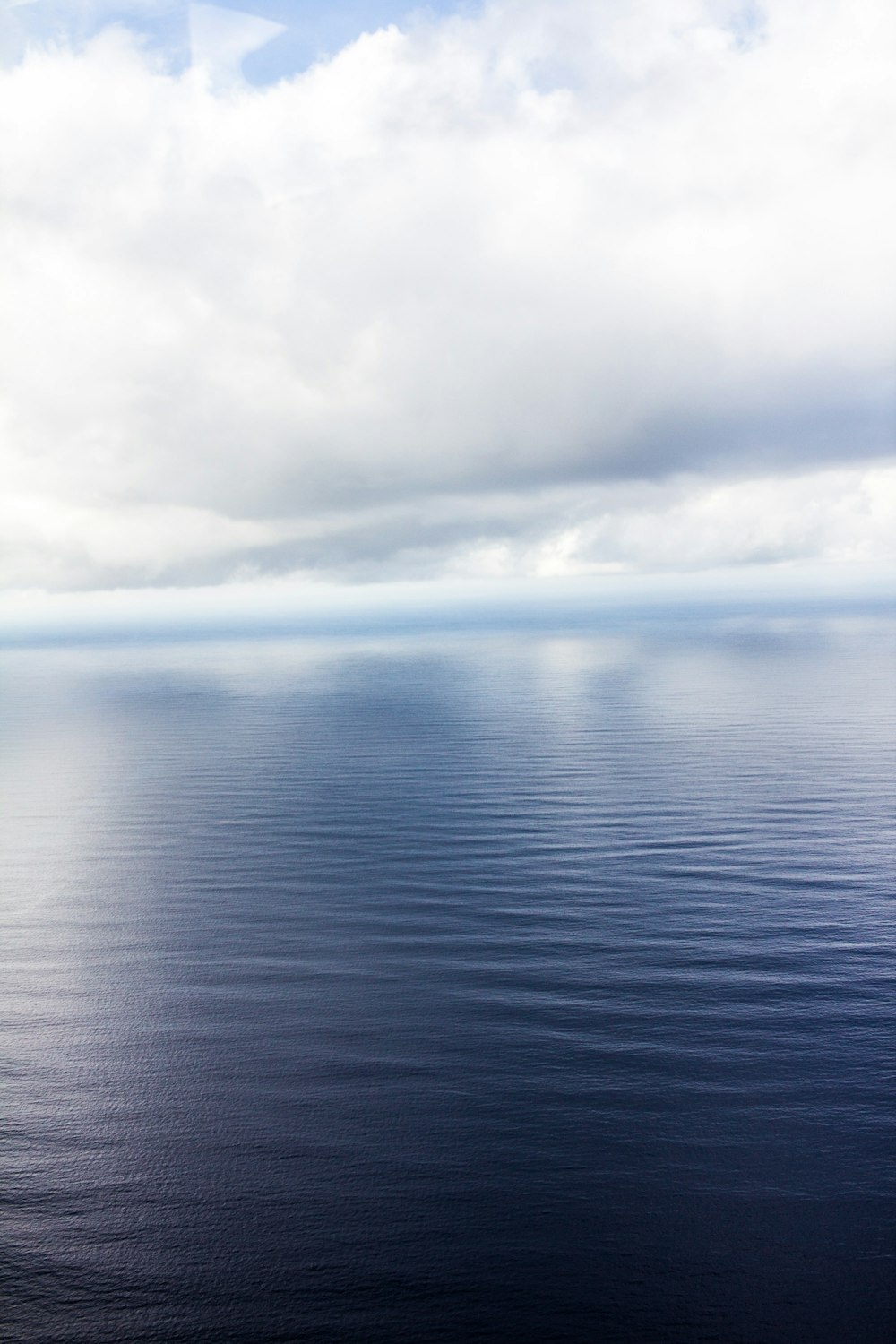 photo of calm body of water