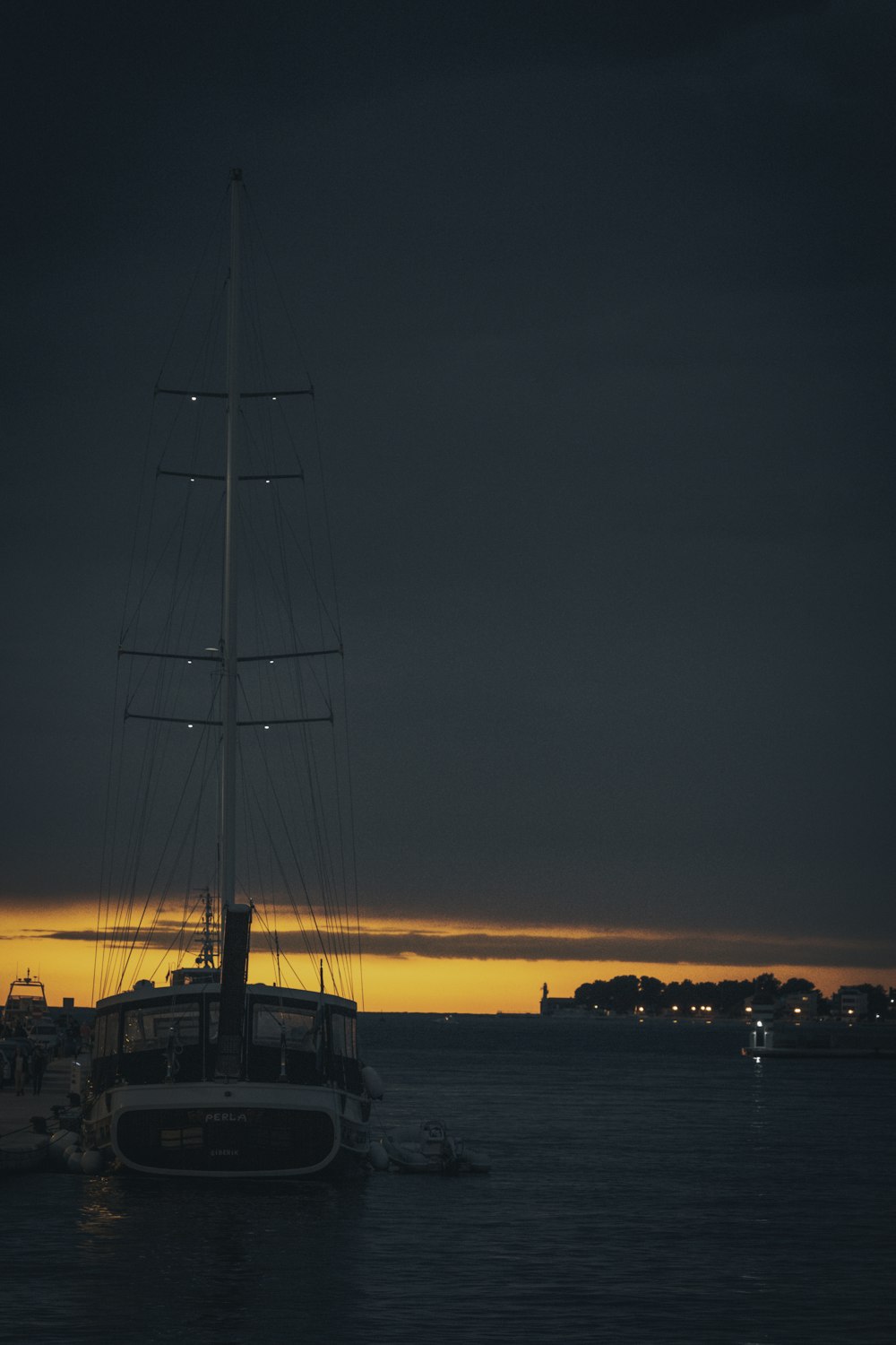 sailing boat on body of water