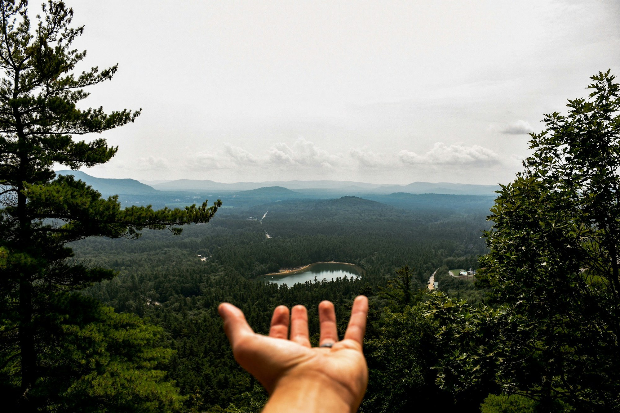 My husband and I embarked on a journey through New Hampshire. Having decided to hike to the top of a mountain, we discovered Lake Echo in the distance. Our dreams are not always as far as they seem.