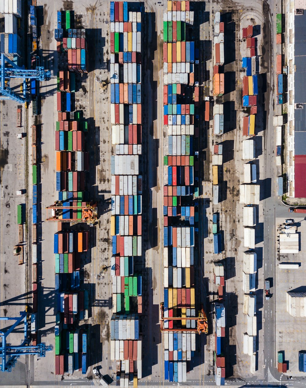 Photo by Mauro Licul aerial view of port with shipping container