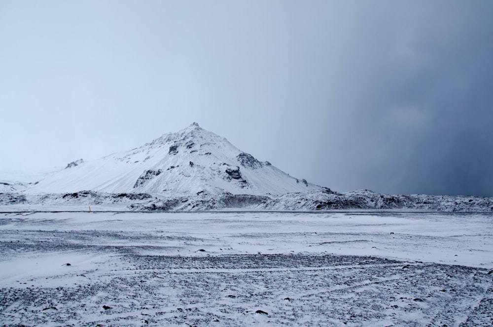 snow-covered mountain during daytime