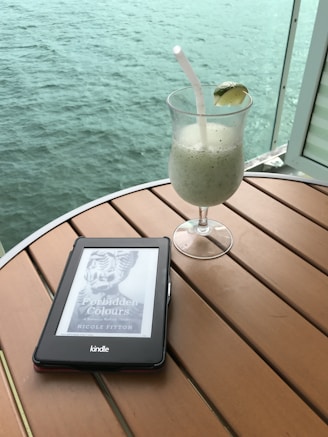 A serene image depicting a person reading an ebook in a peaceful setting.