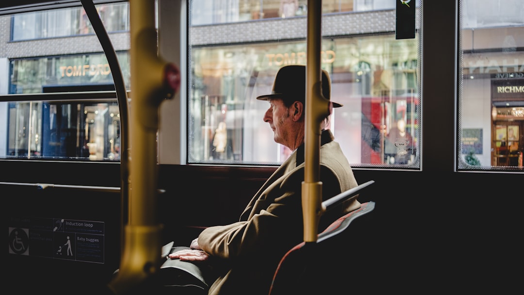 Man sitting on a bus with hat - Customer Lifetime Value – Photo from Unsplash | best digital marketing - London, Bristol and Bath marketing agency