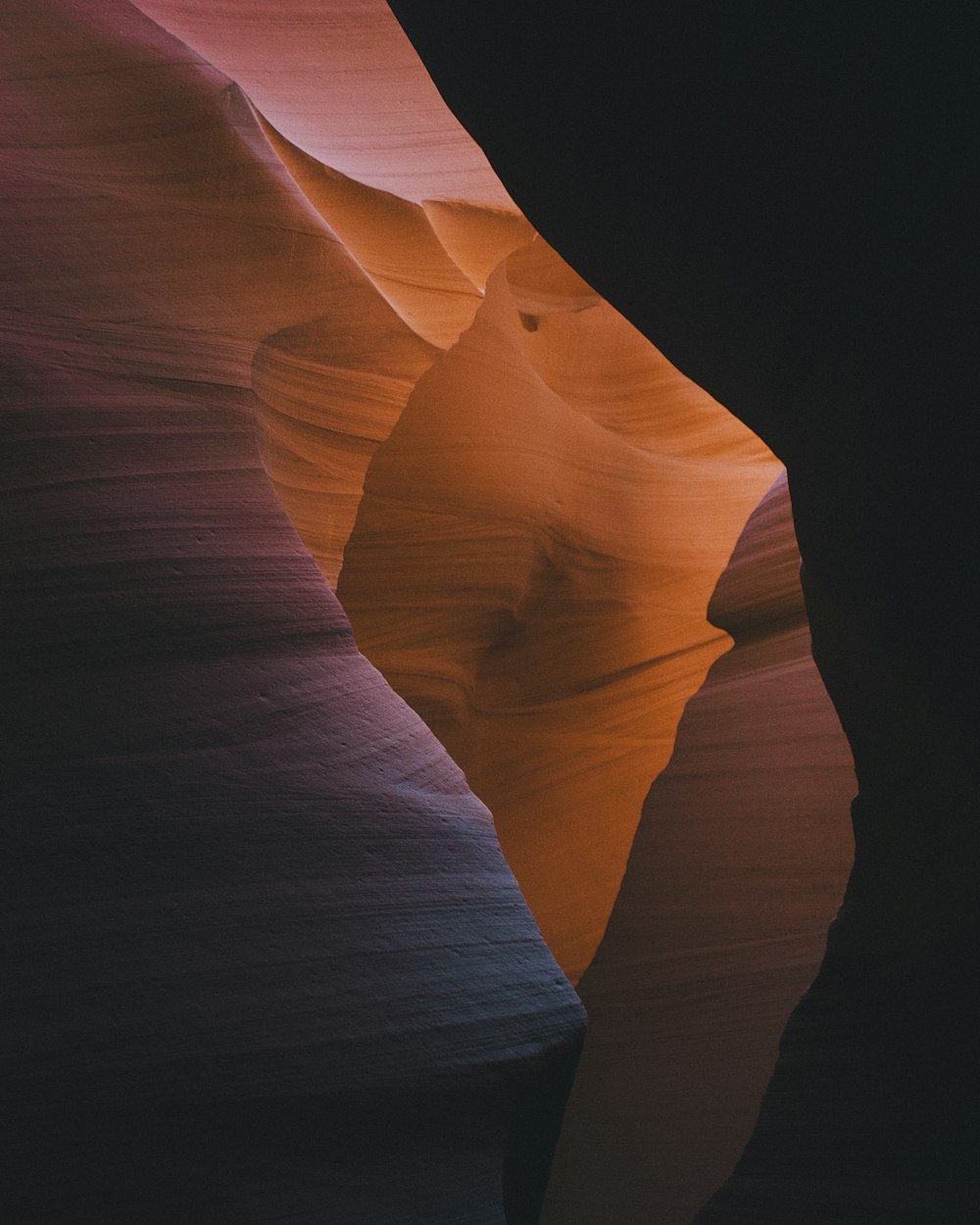 a large canyon with a very tall rock formation