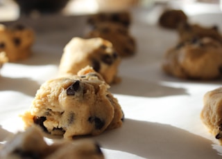 round chocolate cookies on white surface