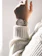 Close-up of a stylish Citizen women's watch on a wrist with soft natural lighting.