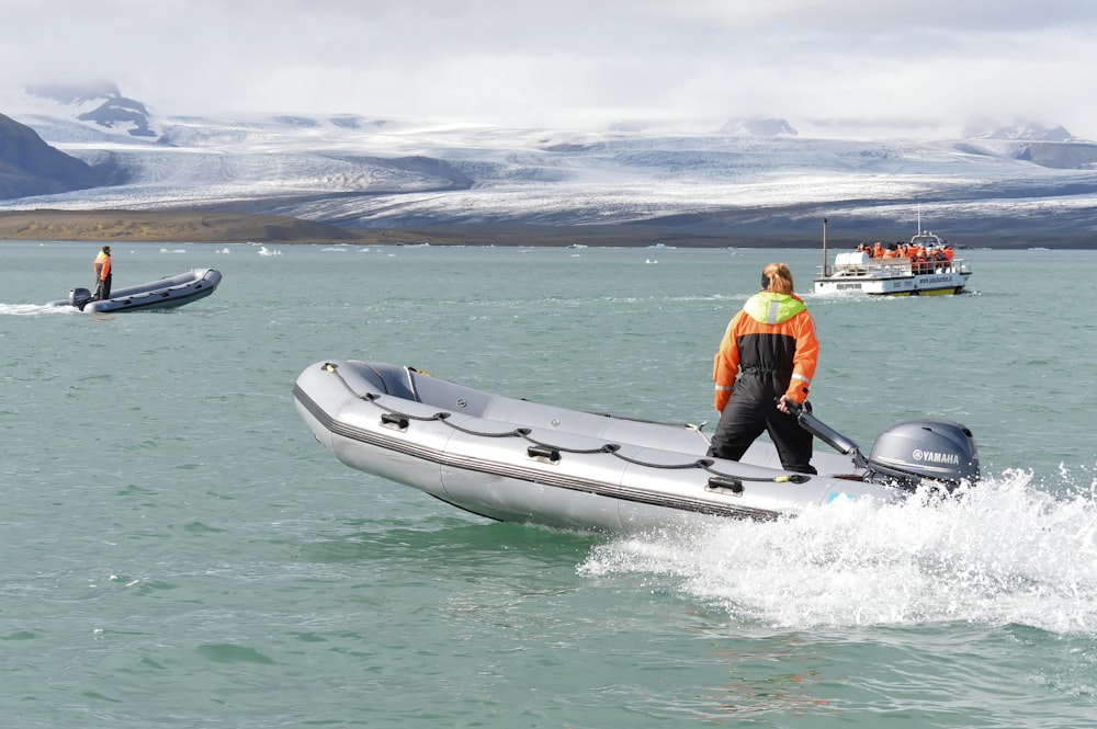 person riding on lifeboat