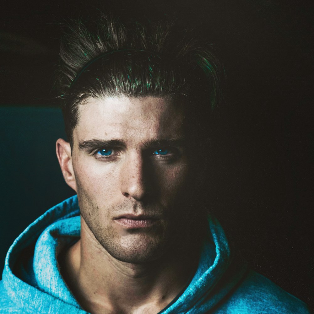 man wearing blue hoodie