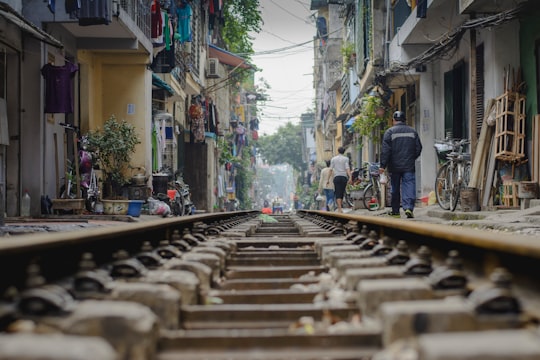 brown metal rail road in Hanoi Vietnam