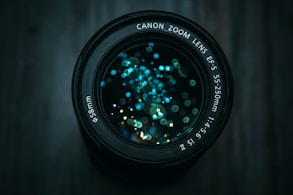 black Canon DSLR camera lens