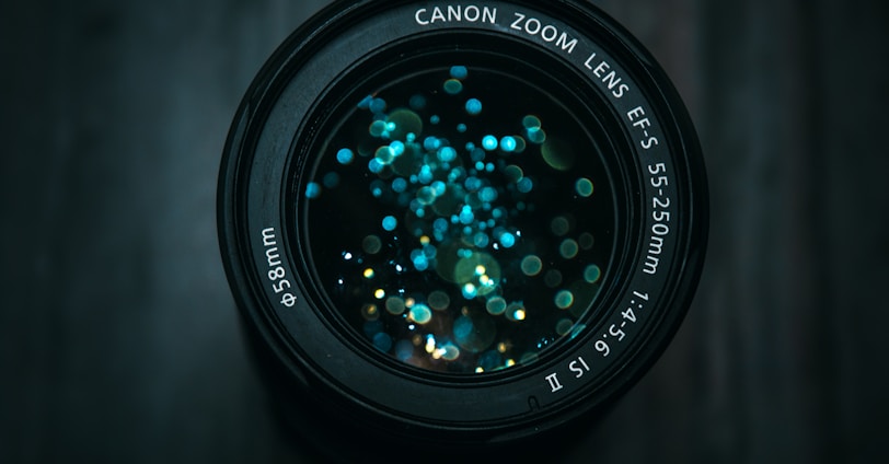 black Canon DSLR camera lens