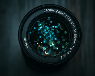 black Canon DSLR camera lens