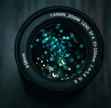 black Canon DSLR camera lens