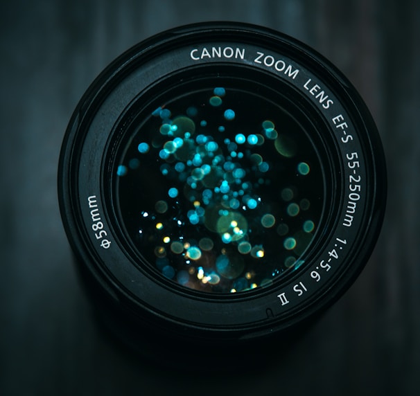 black Canon DSLR camera lens