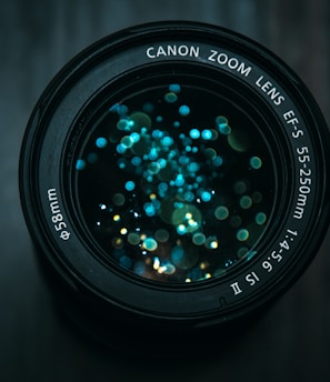 black Canon DSLR camera lens