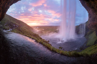 shallow focus photography of water falls