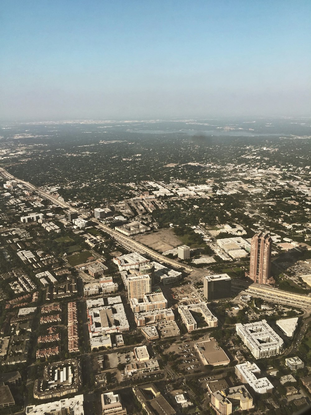 aerial view of city under blue sky during daytime