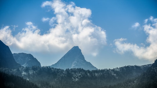 landscape photography of mountains under white clouds in Königssee Germany